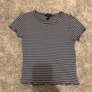 blue,black,and white striped top with lettuce rim